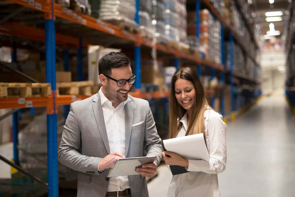 managers-visiting-storage-center-discussing-about-distribution-goals-year-1